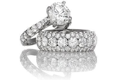 Round Brilliant Solitaire with Diamond Shank and Matching Band